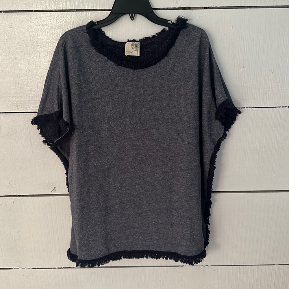 Denim colored oversized top with fringe